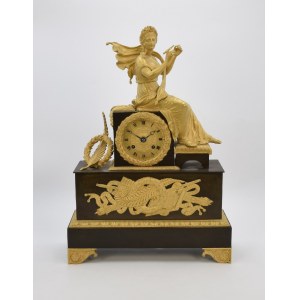 Mantel clock with seated woman