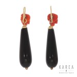 Onyx earrings decorated with coral roses, 19th/20th century.