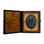 Ferrotype in a box frame-portrait of a child,