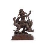 Rzeźbiarz nieokreślony, XX w., Figurka buddyjskiego boga Jambhala na smoku