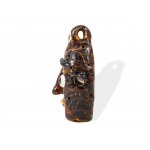 Phoenician sand core glass, Pendant in the form of a portrait head