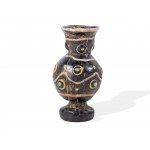 Phoenician sand core glass, In the form of a vase, Damaged, restored