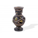 Phoenician sand core glass, In the form of a vase, Damaged, restored