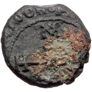 Byzantine seal (Lead, 21,1 mm, 13,52 g). Obv: Cruciform monogram, legend around.