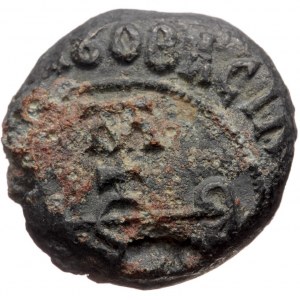 Byzantine seal (Lead, 21,1 mm, 13,52 g). Obv: Cruciform monogram, legend around.