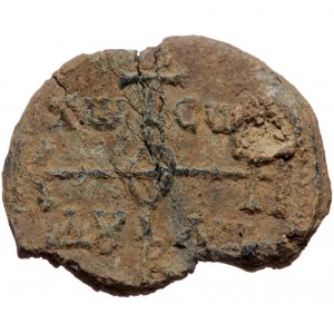 Byzantine seal (Lead, 29,6 mm, 11,74 g). Obv: Legend in four lines.