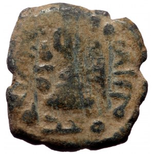 Islamic, Umayyad Caliphate (Arab-Byzantine coinage) 'Abd al-Malik ibn Marwan (AH 65-86 / AD 685-705). Æ Fals (Bronze, 19