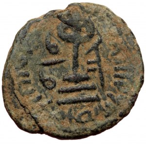 ISLAMIC, Umayyad Caliphate (Arab-Byzantine coinage).end of the C7th and beginning of the 8th century Æ Fals (Bronze, 19m