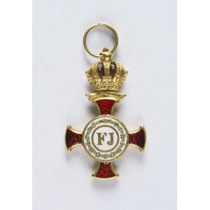 Miniatura złotego krzyża zasługi z koroną, bez wstążki