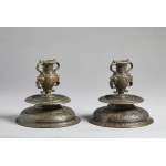 VENETIAN FOUNDRY, XVII CENTURY (?), Pair of engraved candelabra