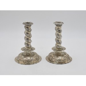 A pair of candlesticks in the Baroque type