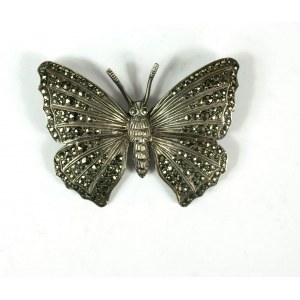 Brooch in the shape of a butterfly with sparkling zircons on the wings, weight 11.4g [82].