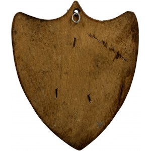 Plaque with the image of Józef Piłsudski against the background of a banner