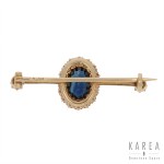 Brooch with sapphire and diamonds, early 20th century.