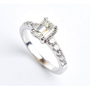 Gold emerald cut diamond ring