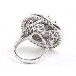 White gold ring with diamond flower and ribbons