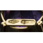 A pair of gold cufflinks