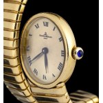 BAUME AND MERCIER tubogas: gold lady's wristwatch, 1990s