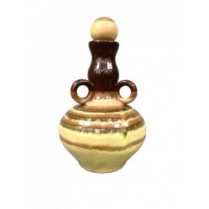 Ceramic carafe with three handles.
