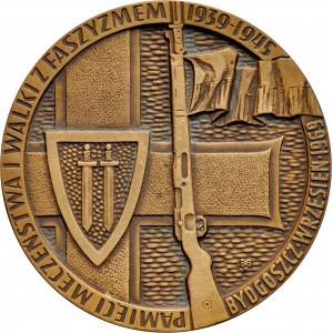 Medaila navrhnutá E. Gorolom v roku 1969, venovaná pamiatke mučeníctva a boja proti fašizmu 1939-1945.