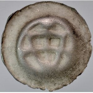 Button brakteat, Av.: Teutonic shield, above it a cross, on the sides a large dot.