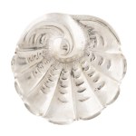 Business card holder in the shape of a shell