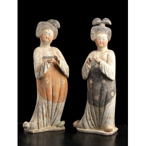 A PAIR OF PAINTED POTTERY FIGURES OF FAT LADIES