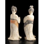 A PAIR OF PAINTED POTTERY FIGURES OF FAT LADIES