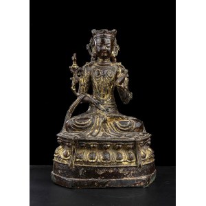 A BRONZE GUANYIN WITH TRACES OF GILDING