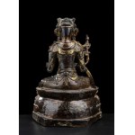 A BRONZE GUANYIN WITH TRACES OF GILDING