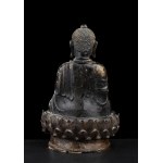A BRONZE BUDDHA WITH TRACES OF GILDING
