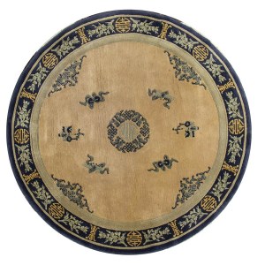 A OCHRE GROUND CIRCULAR CARPET WITH SHOU CHARACTER AND OBJECTS