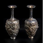 A PAIR OF SILVER SMALL VASES