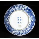 A ‘BLUE AND WHITE' PORCELAIN ‘DRAGON’ DISH