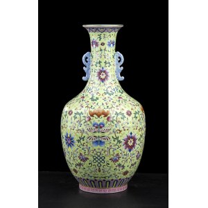 A POLYCHROME ENAMELED GREEN GROUND PORCELAIN BALUSTER VASE