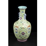 A POLYCHROME ENAMELED GREEN GROUND PORCELAIN BALUSTER VASE