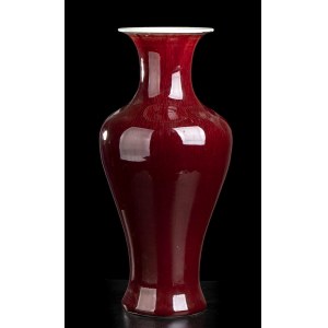 A ‘SANG DE BOEUF’ GLAZED PORCELAIN BALUSTER VASE