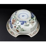 A POLYCHROME ENAMELED PORCELAIN BARBER BOWL