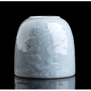 A GLAZED PORCELAIN BEEHIVE WATER POT