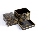 A LACQUERED AND GILT WOOD BOX AND COVER
