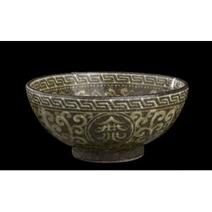 A SLIP INLAID GLAZED CERAMIC BOWL