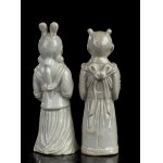 A PAIR OF GLAZED PORCELAIN FIGURES