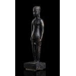 A BRONZE STANDING MALE FIGURE