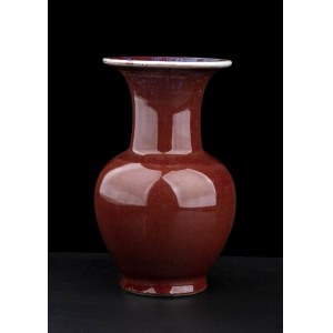 A ‘SANG DE BOEUF’ GLAZED PORCELAIN SMALL VASE