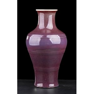 A FLAMBÉ GLAZED PORCELAIN RIBBED BOTTLE VASE