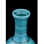 A TURQUOISE GLAZED PORCELAIN VASE