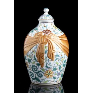 A POLYCHROME ENAMELED PORCELAIN VASE AND COVER