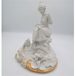 biscuit figure of a seated girl