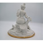 biscuit figure of a seated girl