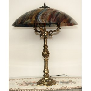 Brass lamp with glass uroboros